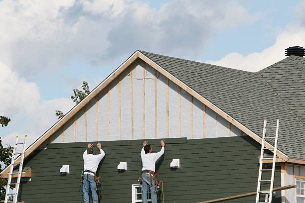 Professional Siding Contractor technician working in Riverside, PA